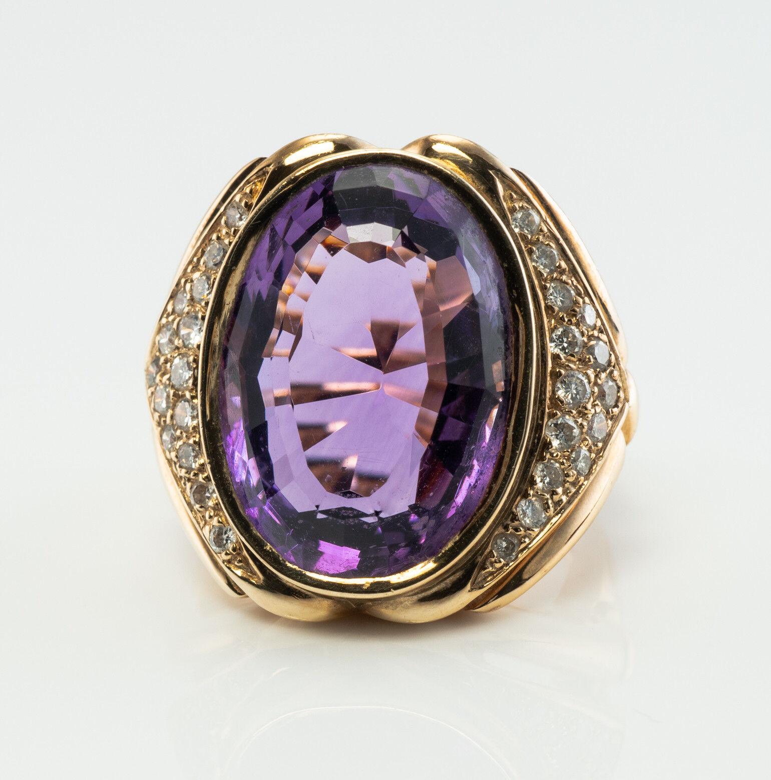 This stunning vintage ring is finely crafted in solid 14K Yellow Gold (carefully tested and guaranteed) and set with genuine Earth mined Amethyst and Diamonds. The center oval cut gem measures 18mm x 13mm (14.00 carats!) and this is a very clean and