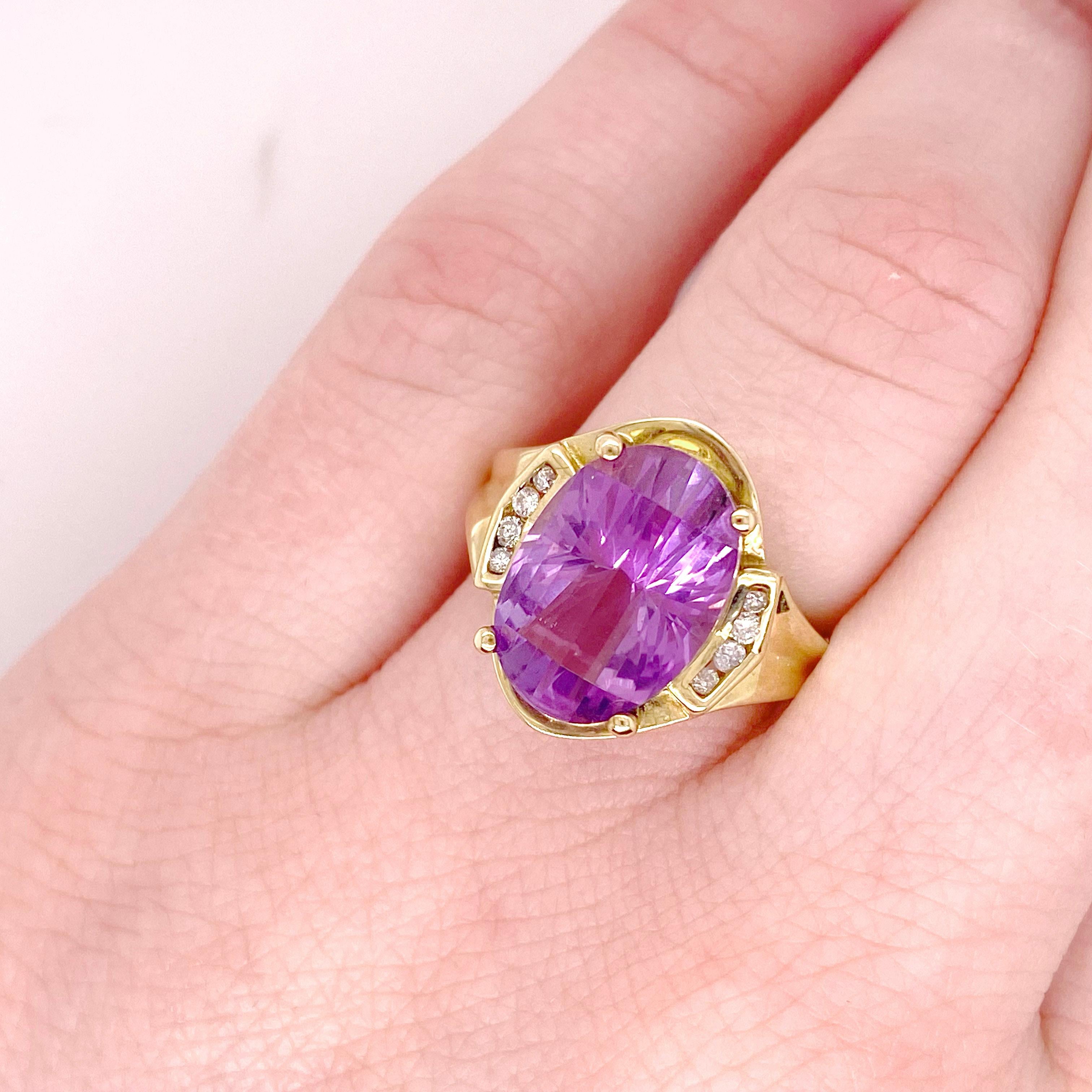 I bet you've never seen a ring like this. This uniquely faceted  6 carat amethyst is one to behold and  with diamonds that flank it are set so that they will not hang or snag on anything. The channel set diamonds have ample gold going over their