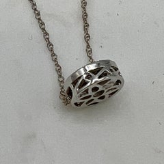 Diamond and 14 Karat White Gold Circular Pendant Necklace