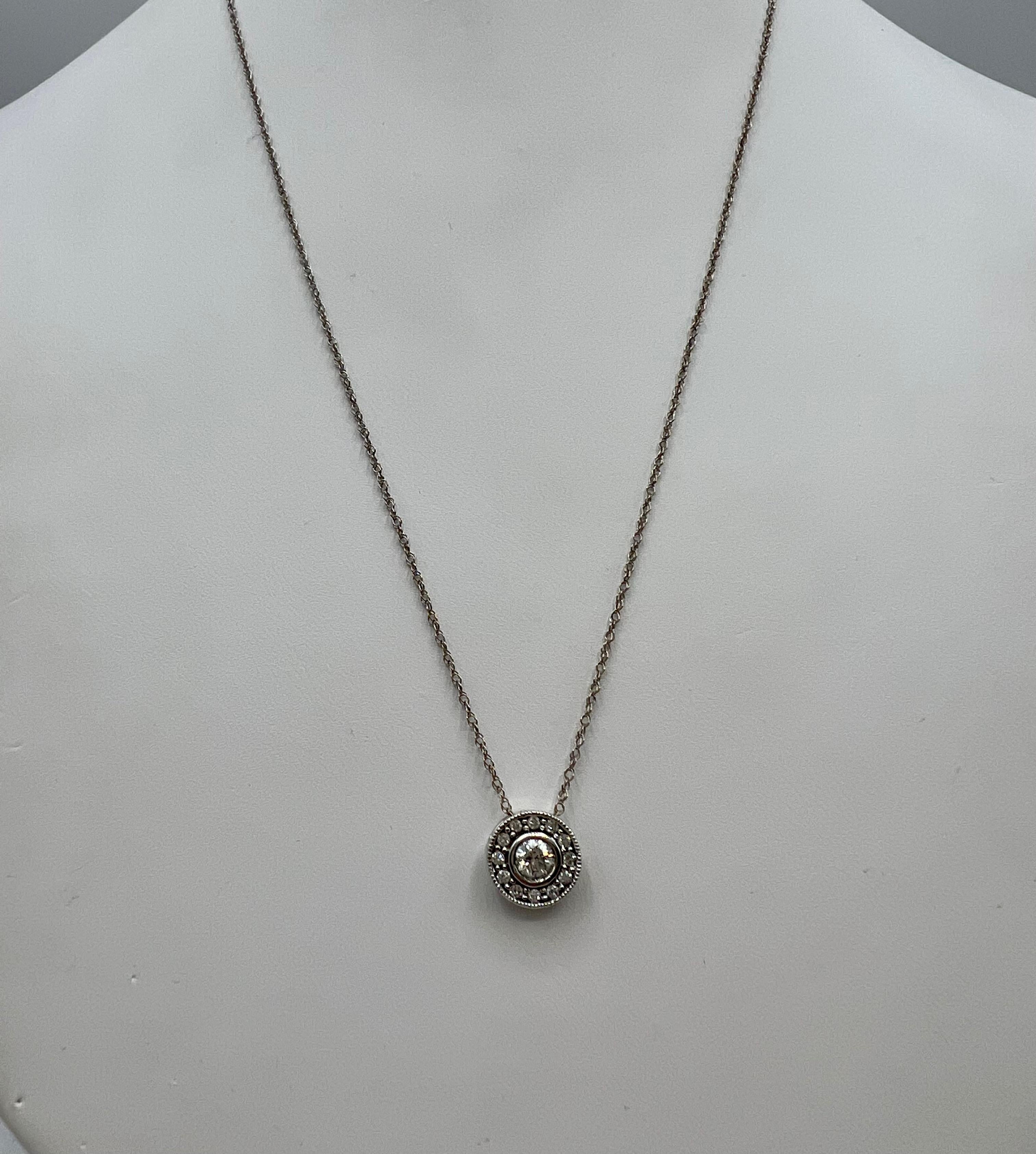 Diamond and 14 Karat White Gold Circular Pendant Necklace  In Excellent Condition For Sale In Berkeley, CA