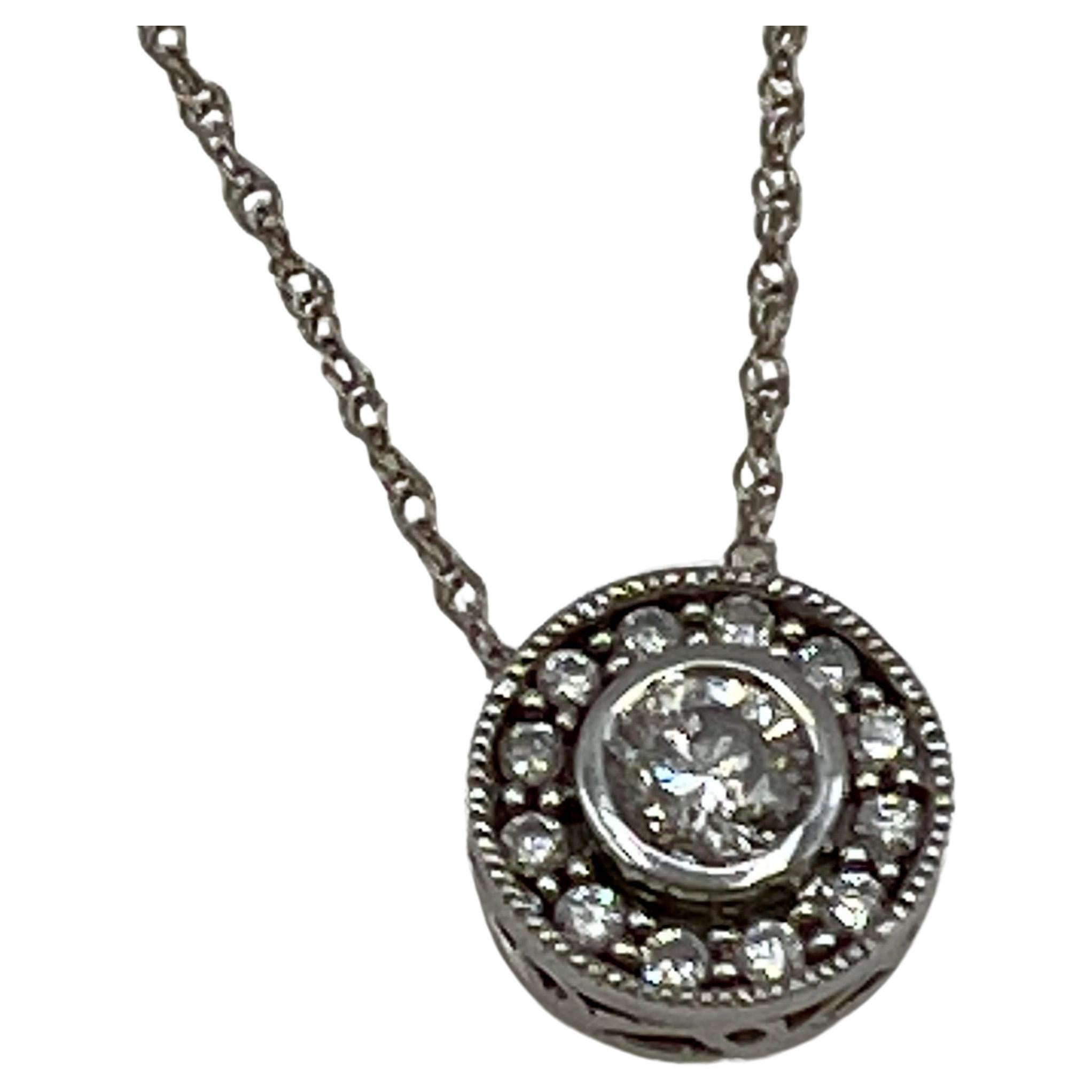 Diamond and 14 Karat White Gold Circular Pendant Necklace 