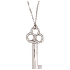 Diamond and 14 Karat White Gold Key Pendant Necklace