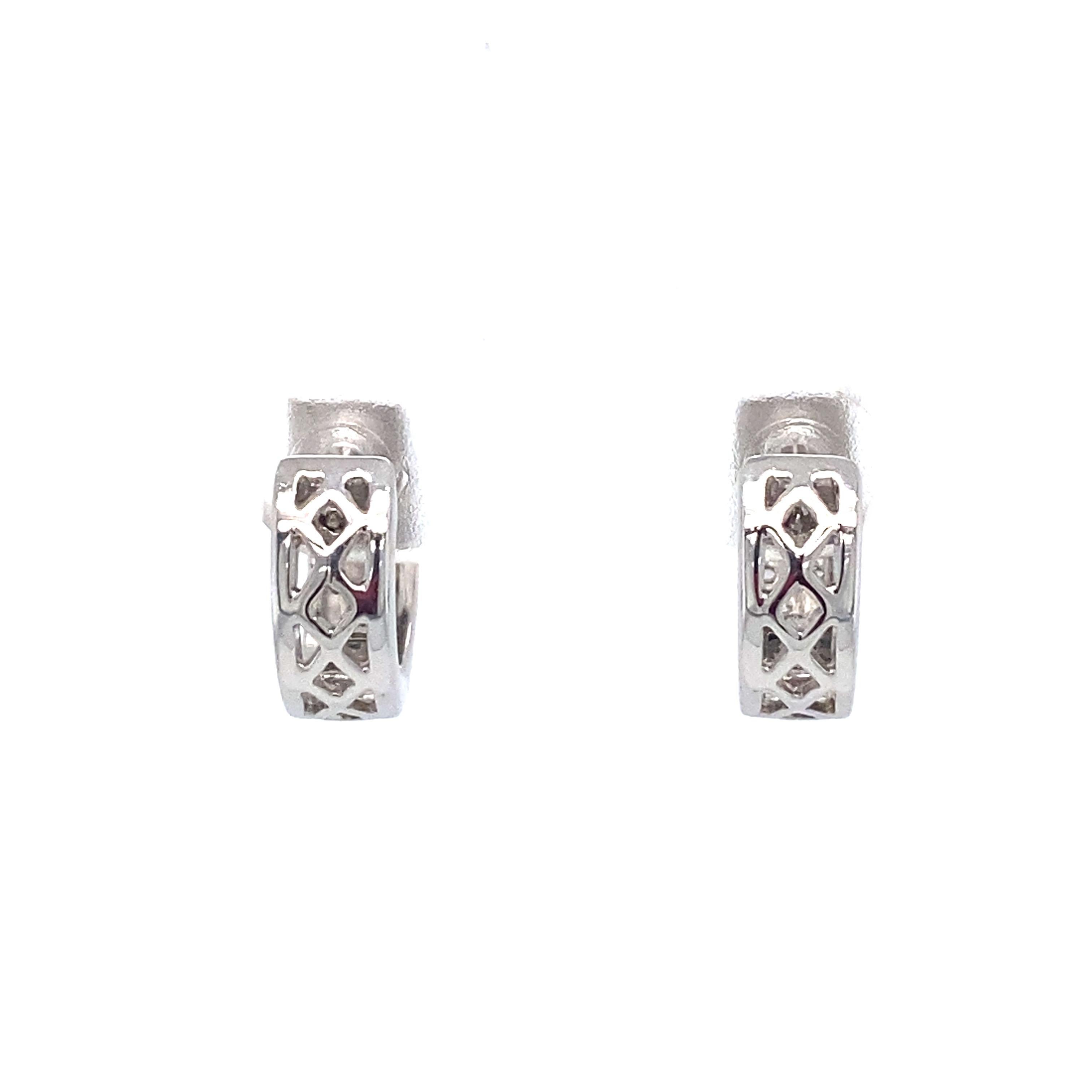 Diamond and 14 Karat White Gold Mini Huggie Hoops In Excellent Condition For Sale In Hicksville, NY