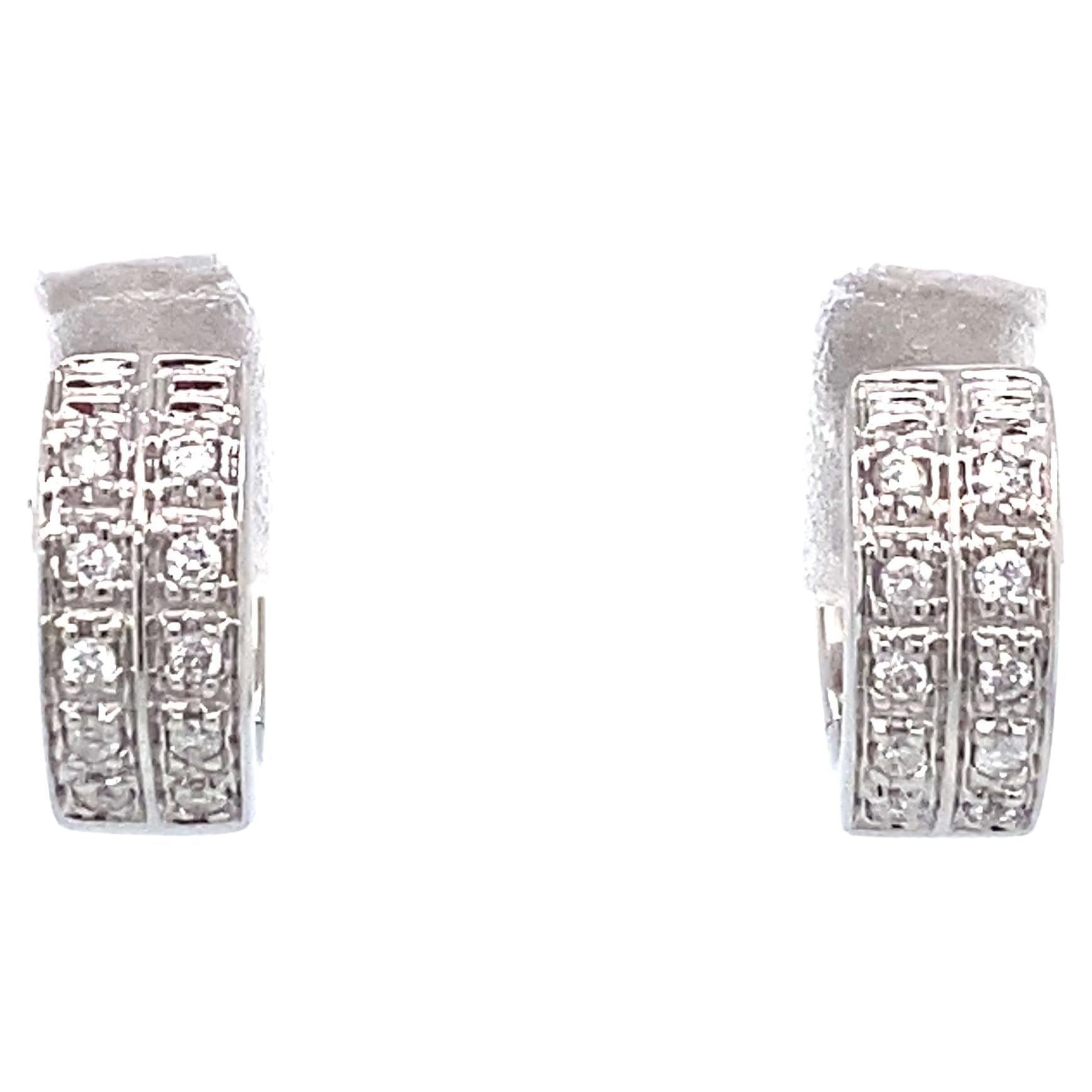 Diamond and 14 Karat White Gold Mini Huggie Hoops For Sale