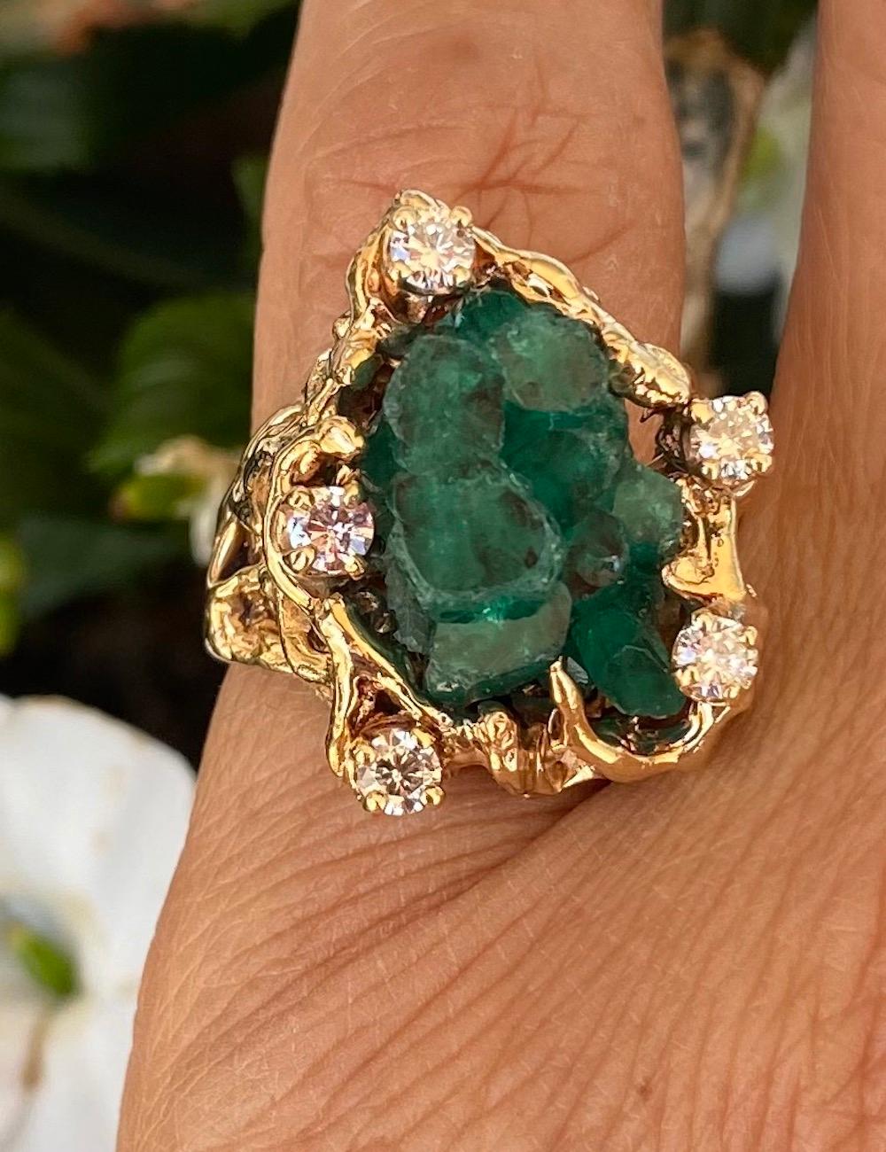 Diamond & Emerald Beryl Crystal Mineral Ring 14 Karat Yellow Gold
Exciting ring features this organic Beryl Emerald with 9 hexagon crystal protruding from its natural early form.
The emerald itself measures 15 x 12 by 12 mm deep.
Estimated weight is
