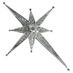 Diamante e stella in oro bianco 18 carati