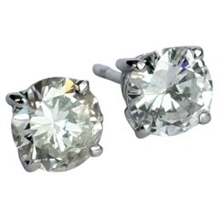 Boucles d'oreilles en or blanc 18 carats et diamants