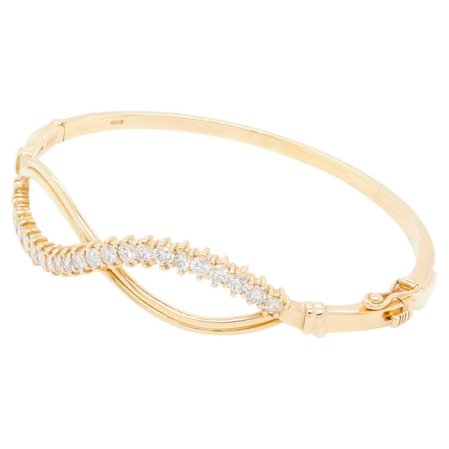 Infinity-Armreif aus Diamanten und 18 Karat Gelbgold, 1981 im Angebot