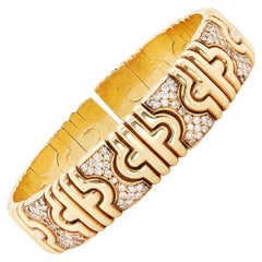 Flexibler Armreif aus Diamanten und 18 Karat Gelbgold mit Statement