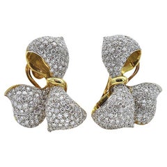 Orecchini a fiocco con diamanti e oro 18 carati