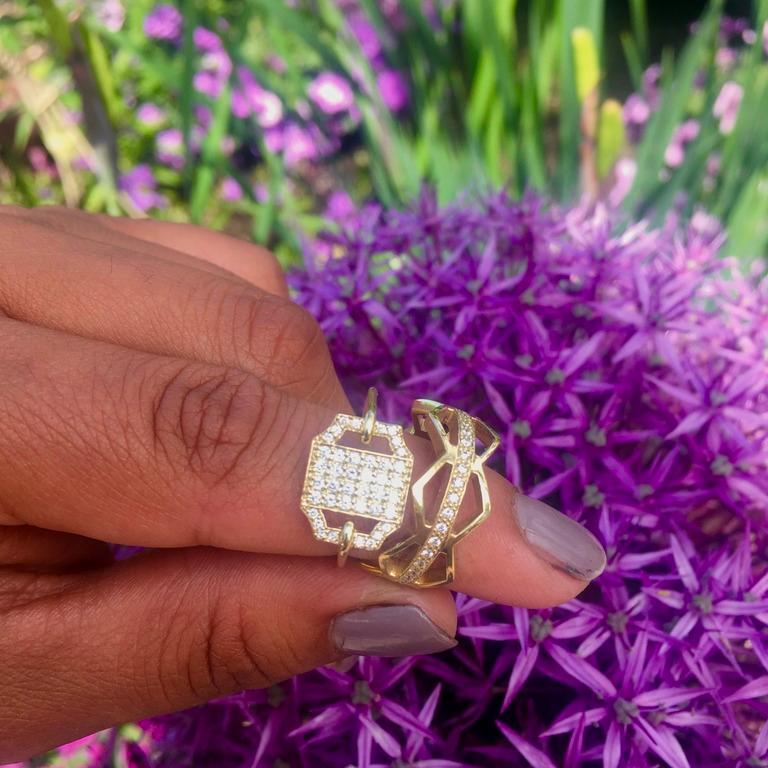 Our Petite Edge Ring has a modern Deco feel.  Perfect alone, it can also be stacked with other band rings. A beautiful sparkle of diamonds set in a classic, geometric design for day to night style.

18 Karat Gold, Diamonds (.50ct) 
Available in size