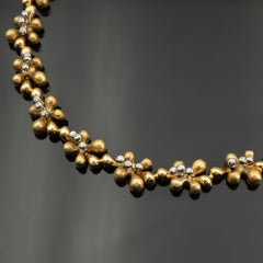 Diamond and 18-Karat Gold Hammered Floral Necklace