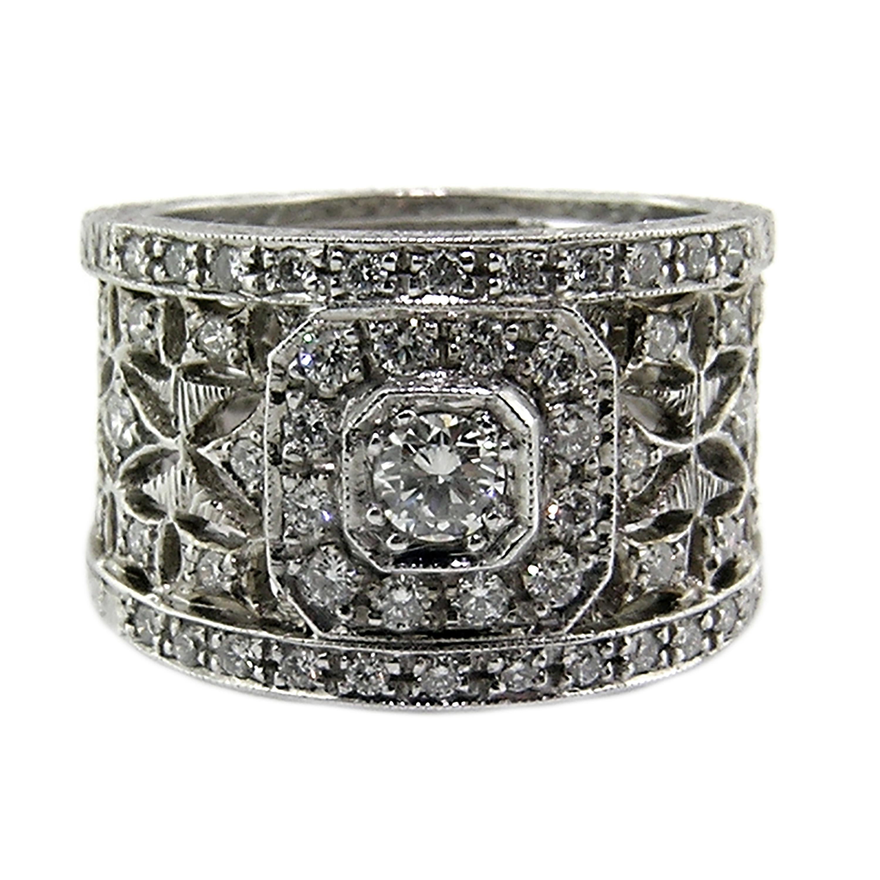 The Florentine Lace ring is big and bold. This showstopper is finished on all visible surfaces with exquisitely detailed Florentine engraving and is set with nearly a carat of gorgeous diamonds. 

This ring is designed for wearability: it features a