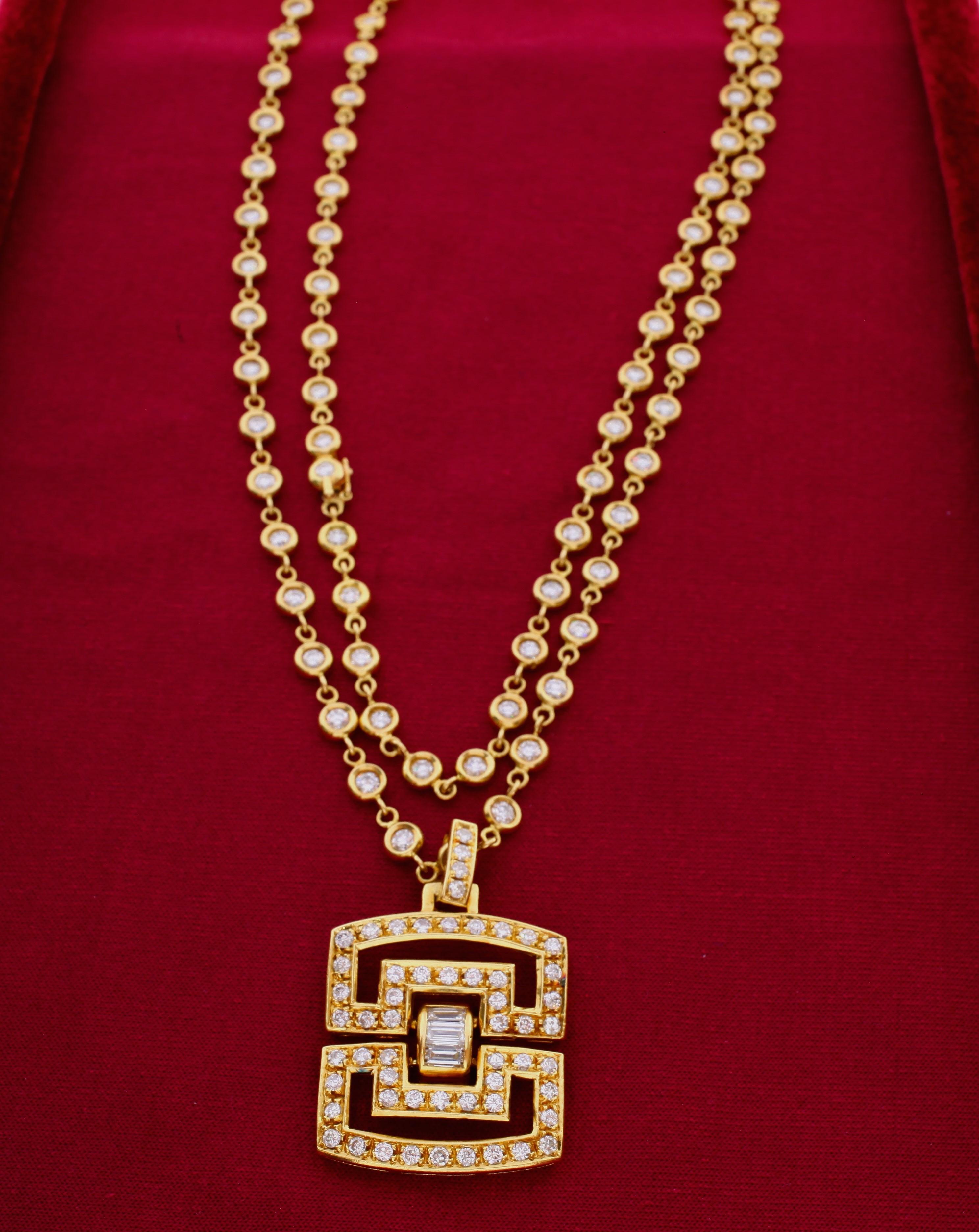 This diamond chain and pendant have each been stamped 750 for 18 karat yellow gold.
Diamonds estimated to weigh a total of approximately 9.00 - 11.00 carats, averaging H-I color, SI-I clarity, as gauged and graded in the mount.
Total gross weight 59