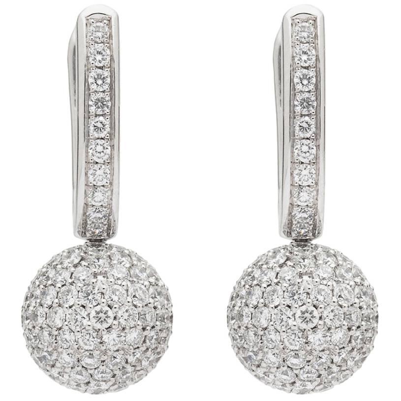 Diamond and 18 Karat White Gold Earrings by Gubelin