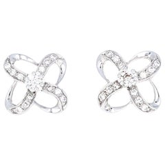 Diamond and 18 Karat White Gold Intersecting Bow Earrings, 0.45 Carat Diamonds