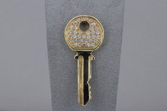 Diamond and 18 Karat Yellow Gold Key Pendant