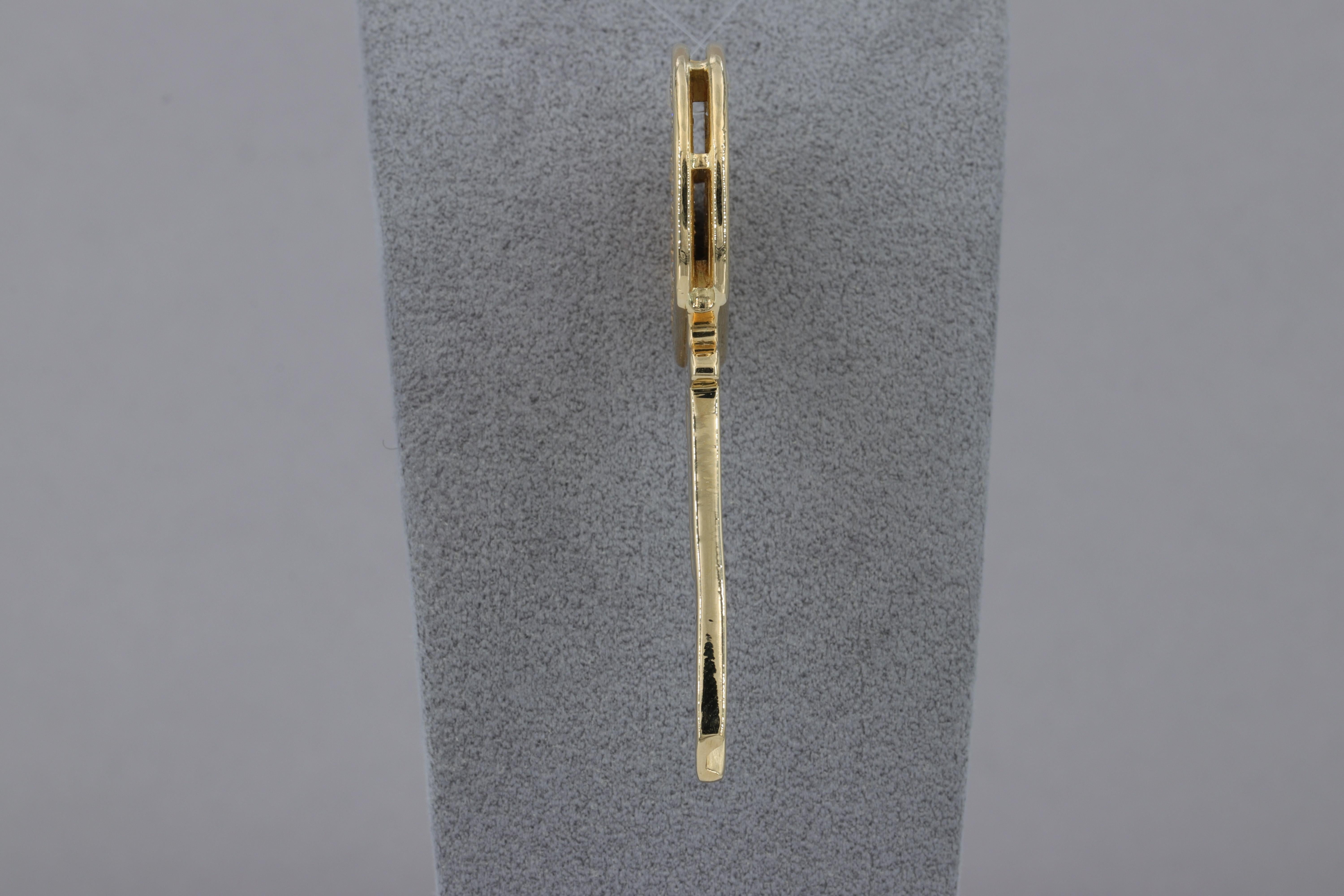 Round Cut Diamond and 18 Karat Yellow Gold Key Pendant For Sale