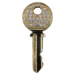 Schlüsselanhänger aus 18 Karat Gelbgold mit Diamanten