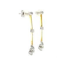 Boucles d'oreilles pendantes en or bicolore 18k et diamants, poids total de 0,80 carats