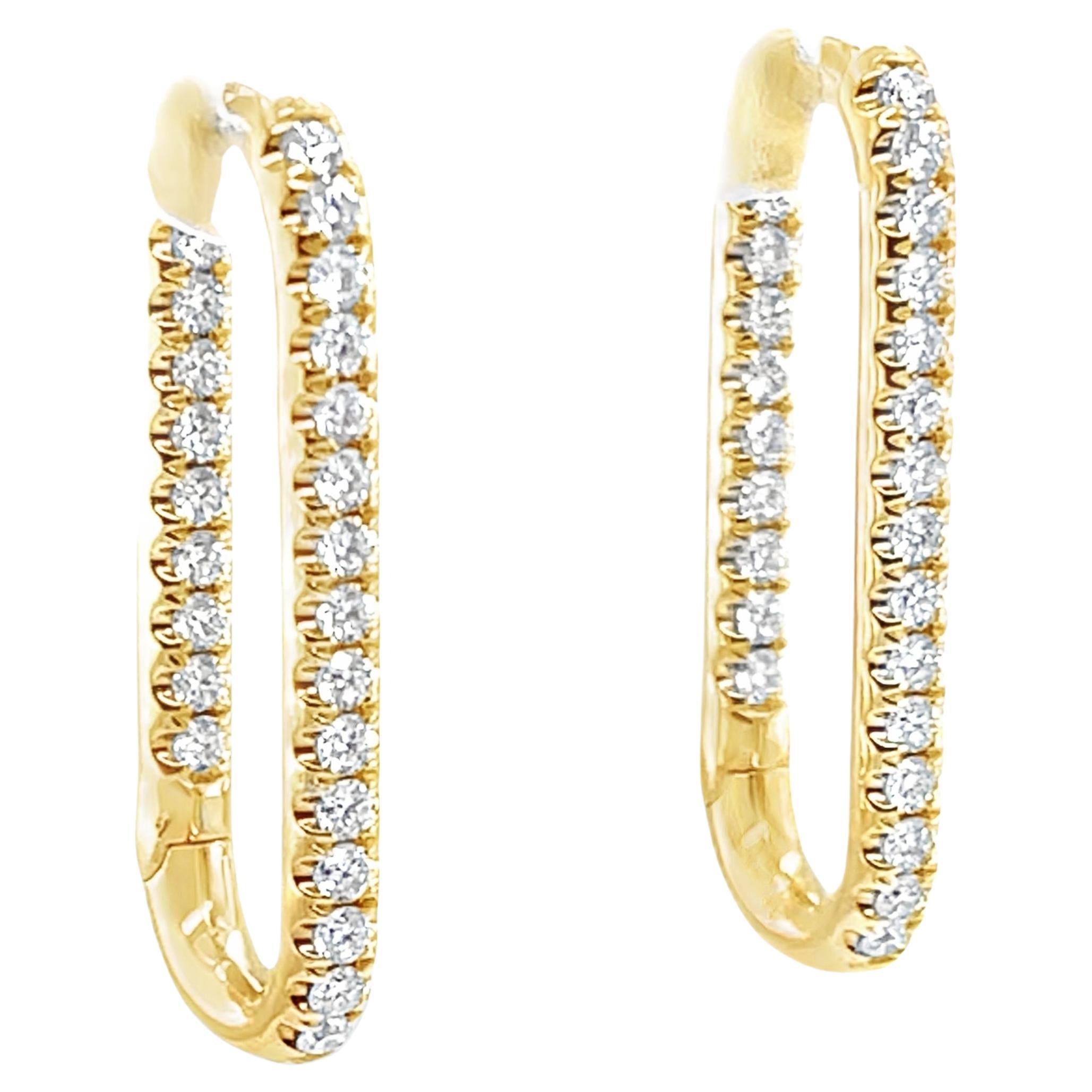 Boucles d
oreilles allongées en or jaune 18 carats et diamants, 0,78 carat au total