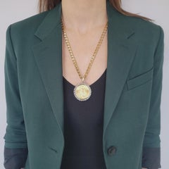 Diamond and $20 US Coin and diamond pendant with 18k yellow gold chain.