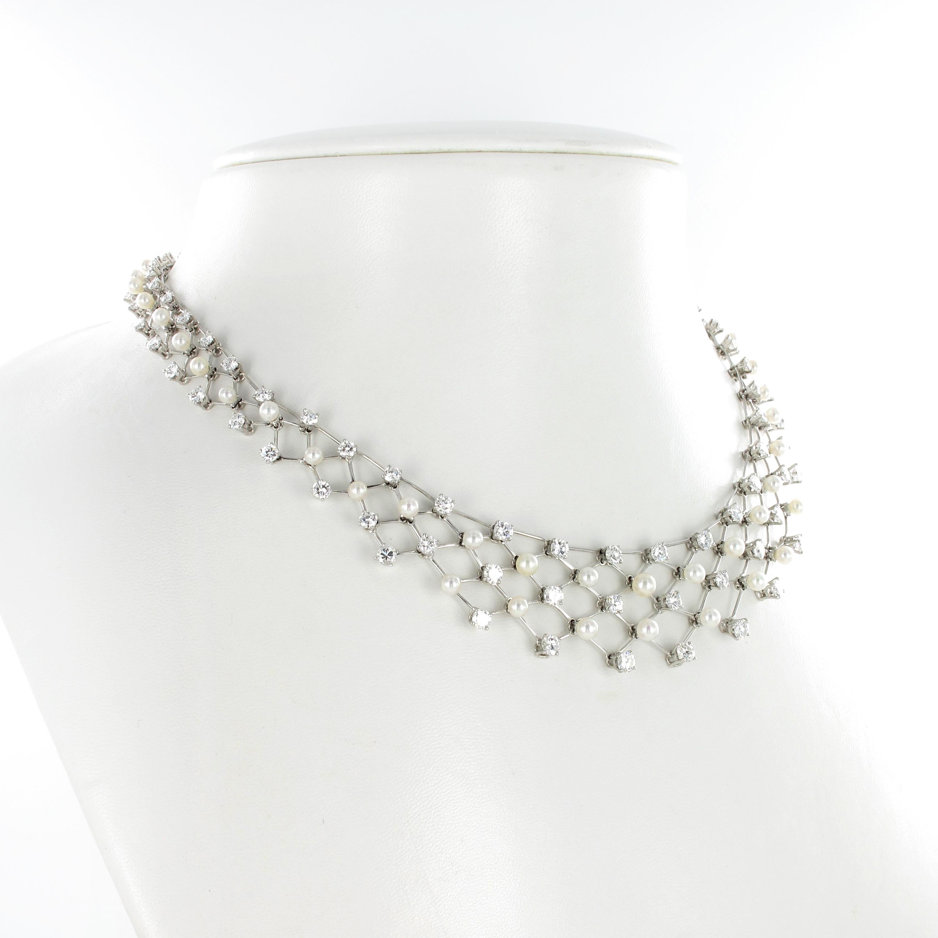 This delicate and flexible handcrafted platinum necklace is set with 95 brilliant-cut diamonds of G/H colour and vs clarity, total weight approximately 10.00 carats. Accented by 51 beautiful, round Akoya cultured pearls with superb luster, ranging