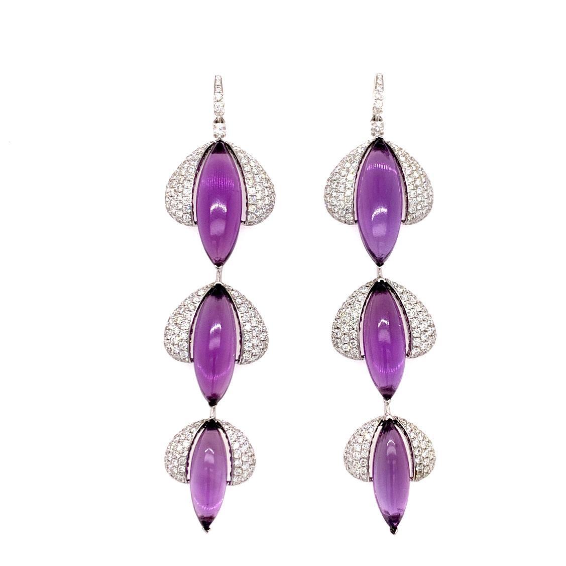 Long earrings with magnificent marquise amethyst cabochons that are surrounded by micro-pavé diamonds.

•	Total Diamond Weight: 4.22 carats 
•	Amethyst Weight: 18.85 carats
•	Diamond Quality/Colour: VS/FG (Clean, White)
