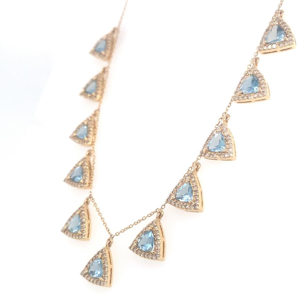 Natural 1.52-carat diamond and 3.69-carat aquamarine drop necklace set in 14-karat yellow gold with an adjustable necklace chain setting. 