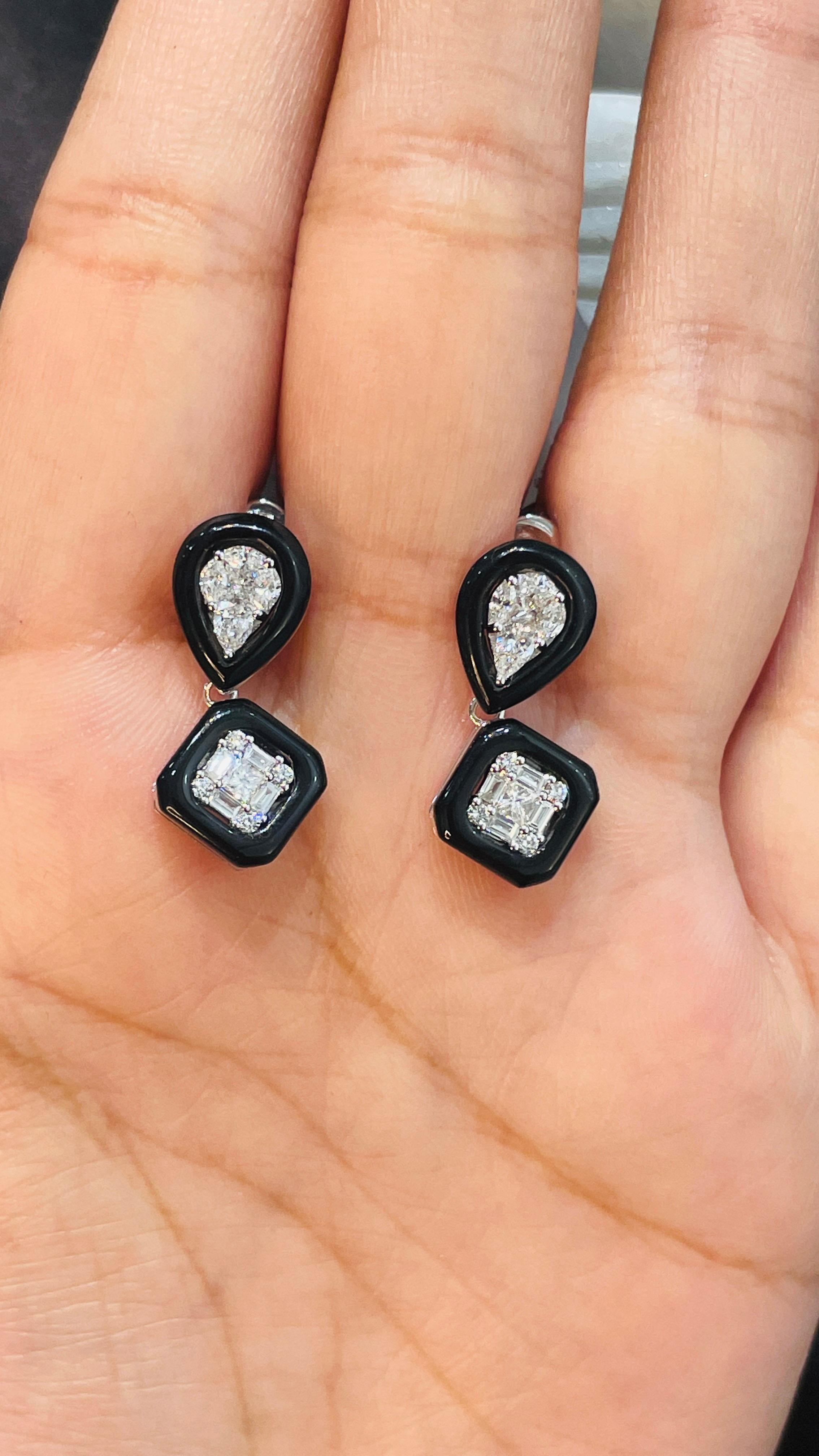 Diamond and Black Enamel Dangle earrings to make a statement with your look. These earrings create a sparkling, luxurious look featuring mix cut diamonds.
If you love to gravitate towards unique styles, this piece of jewelry is perfect for you.
For