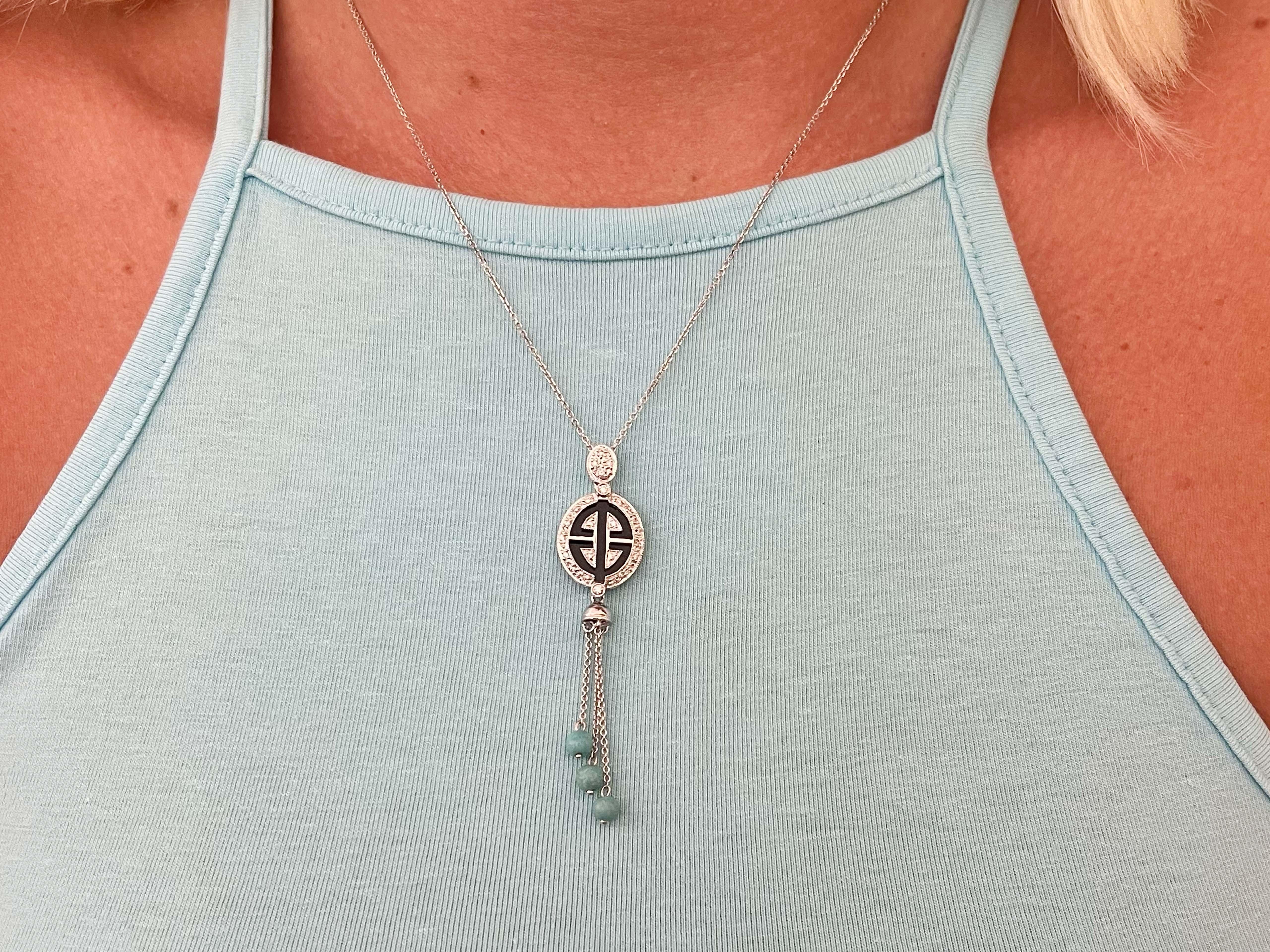 Item Specifications:

Metal: 18K White Gold

Necklace Weight: 6 grams

Diamond Carat Weight: ~0.15 carats
​
​Turquoise Diameter: 4.24 mm

Chain Length: 18