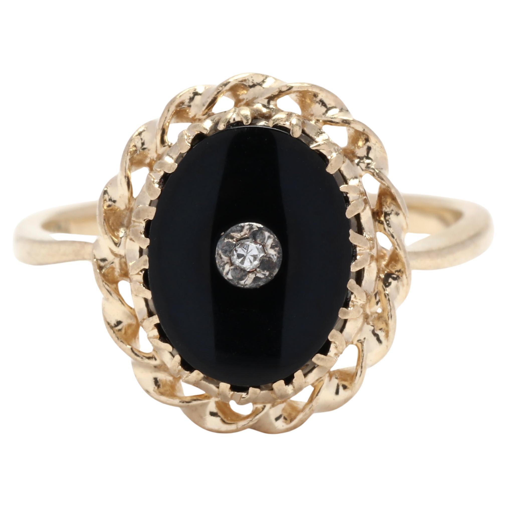 Diamond and Black Onyx Oval Ring, 10K Yellow Gold, Ring Size 5.5 For Sale