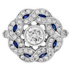 Anello con diamanti e zaffiri blu in stile Art Déco in oro bianco 18 carati