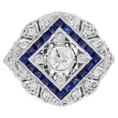 Verlobungsring aus 18 Karat Weißgold mit Diamanten und blauen Saphiren im Art-déco-Stil