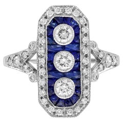 Anello a tre pietre con diamante e zaffiro blu in stile Art Déco in oro bianco 18 carati