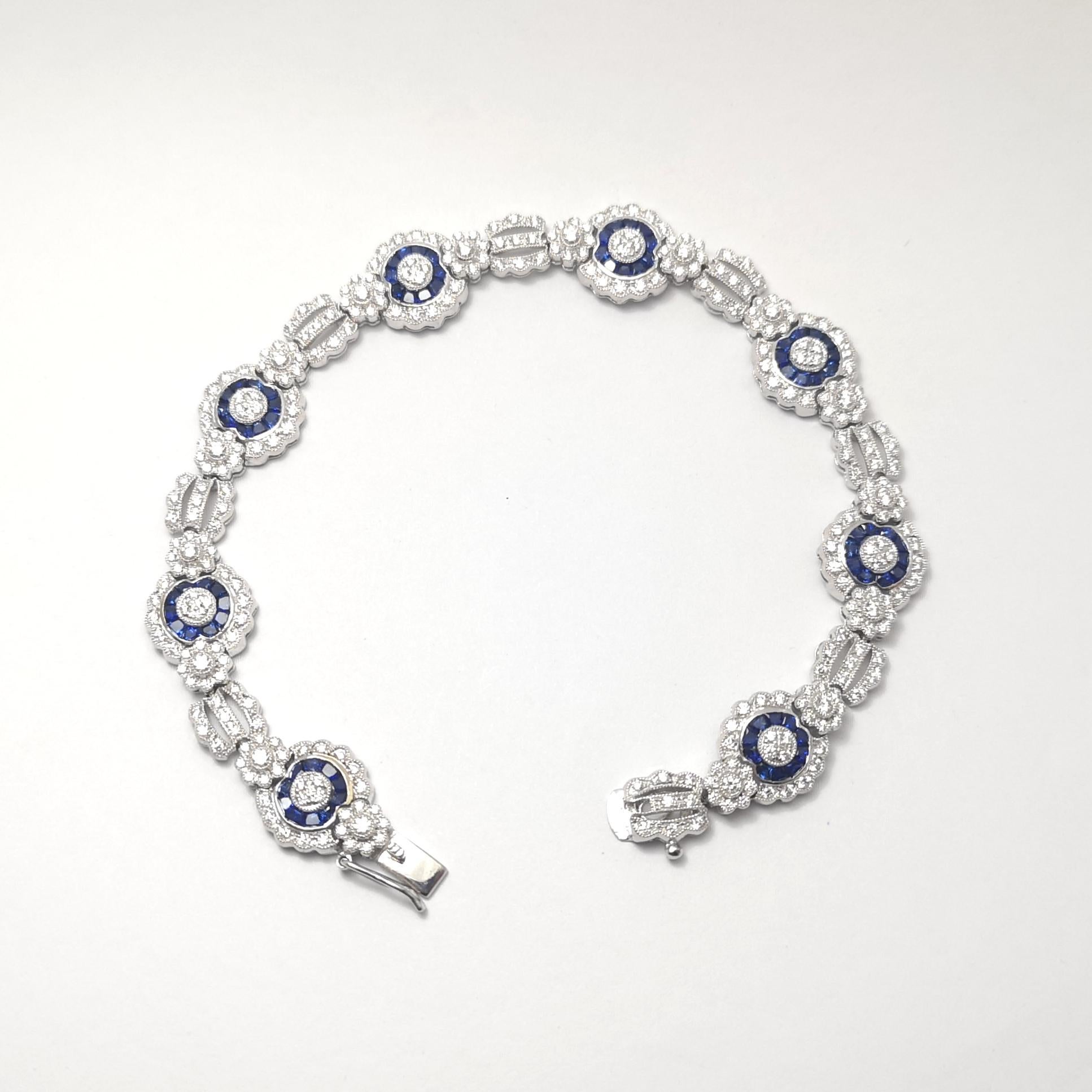 Diamond and Blue Sapphire Bracelet set in 18K White Gold Settings For Sale 9