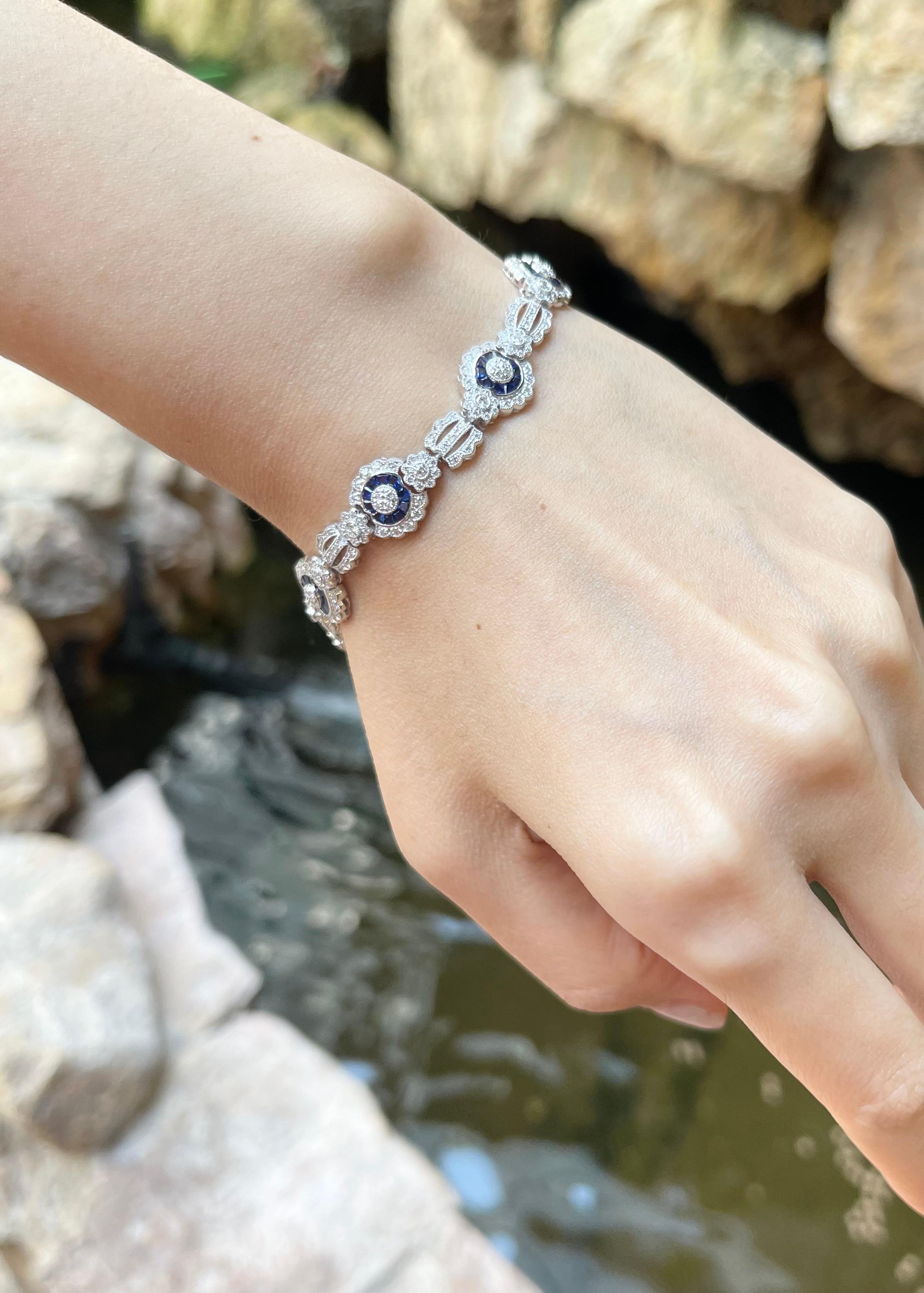 Brilliant Cut Diamond and Blue Sapphire Bracelet set in 18K White Gold Settings For Sale