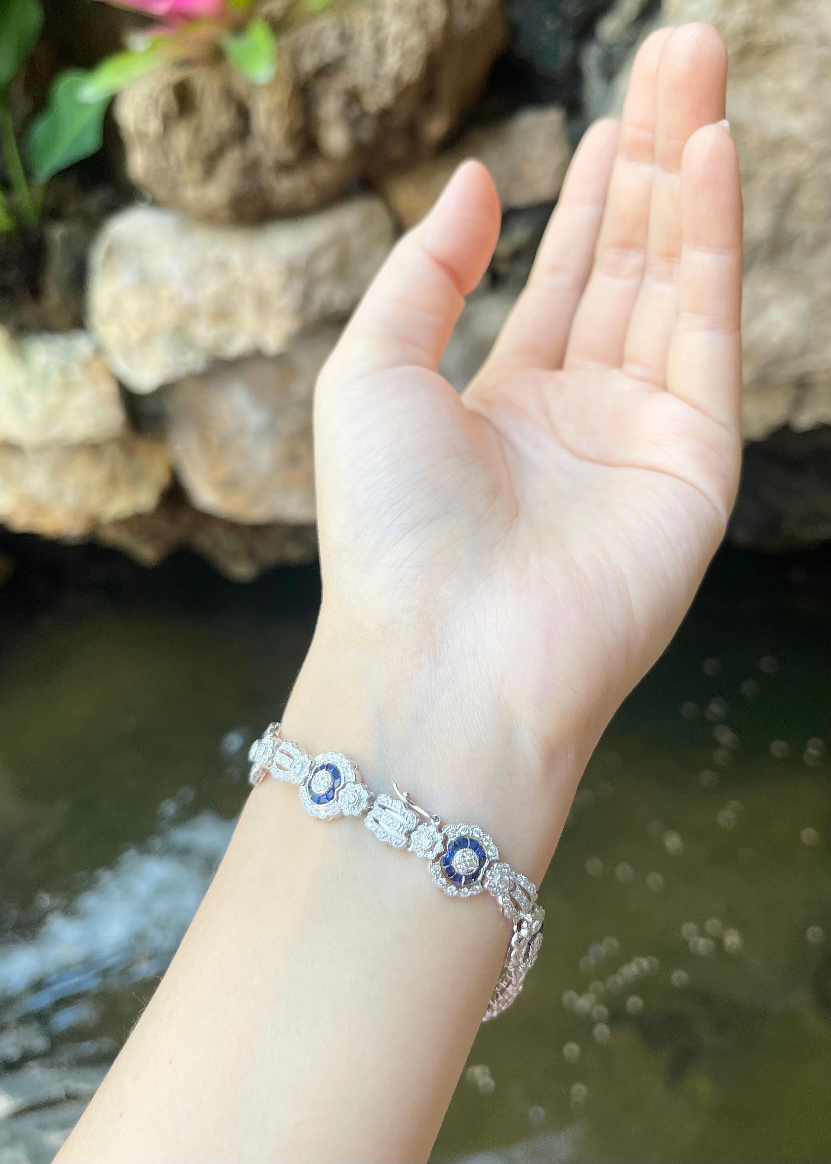 Women's Diamond and Blue Sapphire Bracelet set in 18K White Gold Settings For Sale