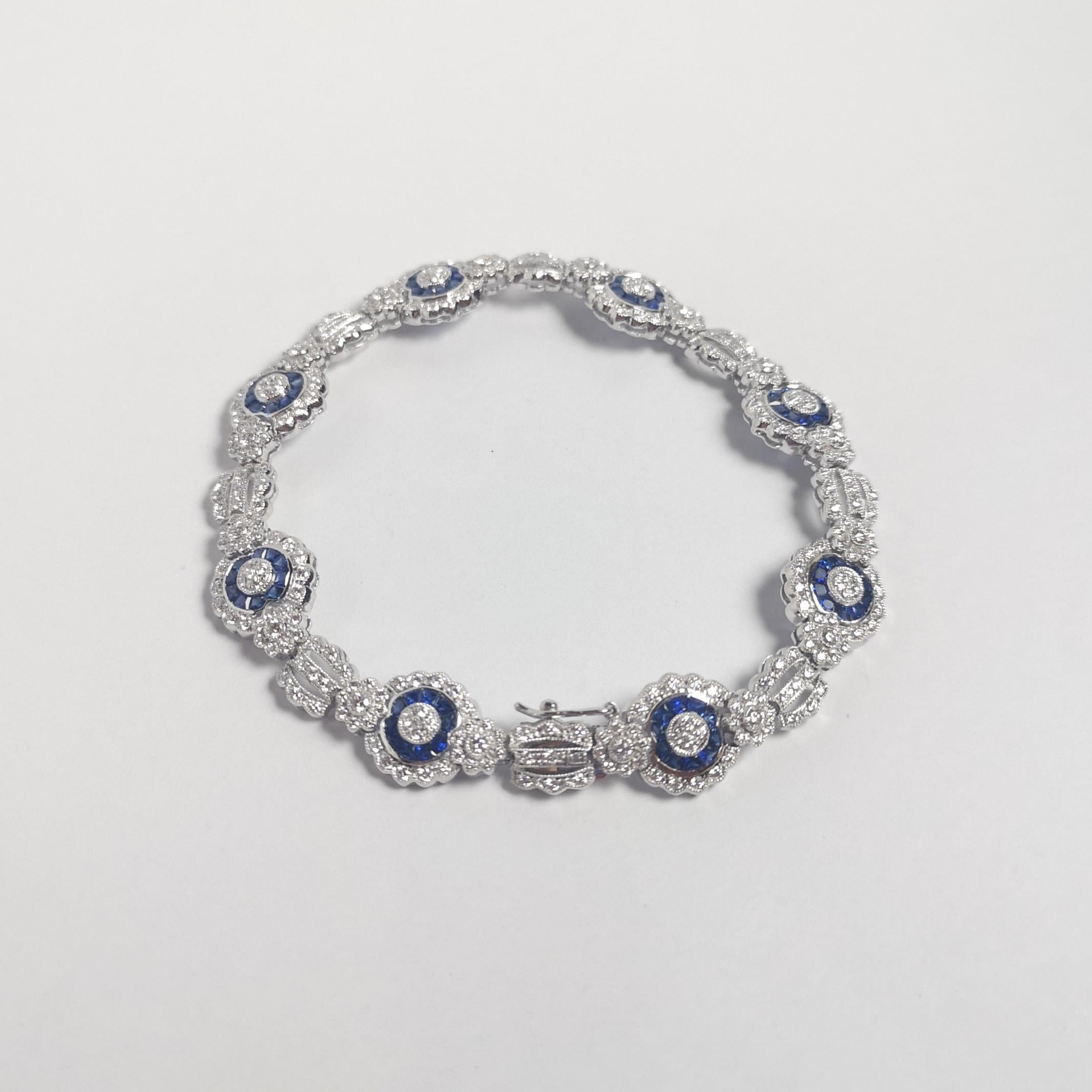 Diamond and Blue Sapphire Bracelet set in 18K White Gold Settings For Sale 1