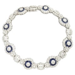 Bracelet en diamant et saphir bleu serti dans des montures en or blanc 18K
