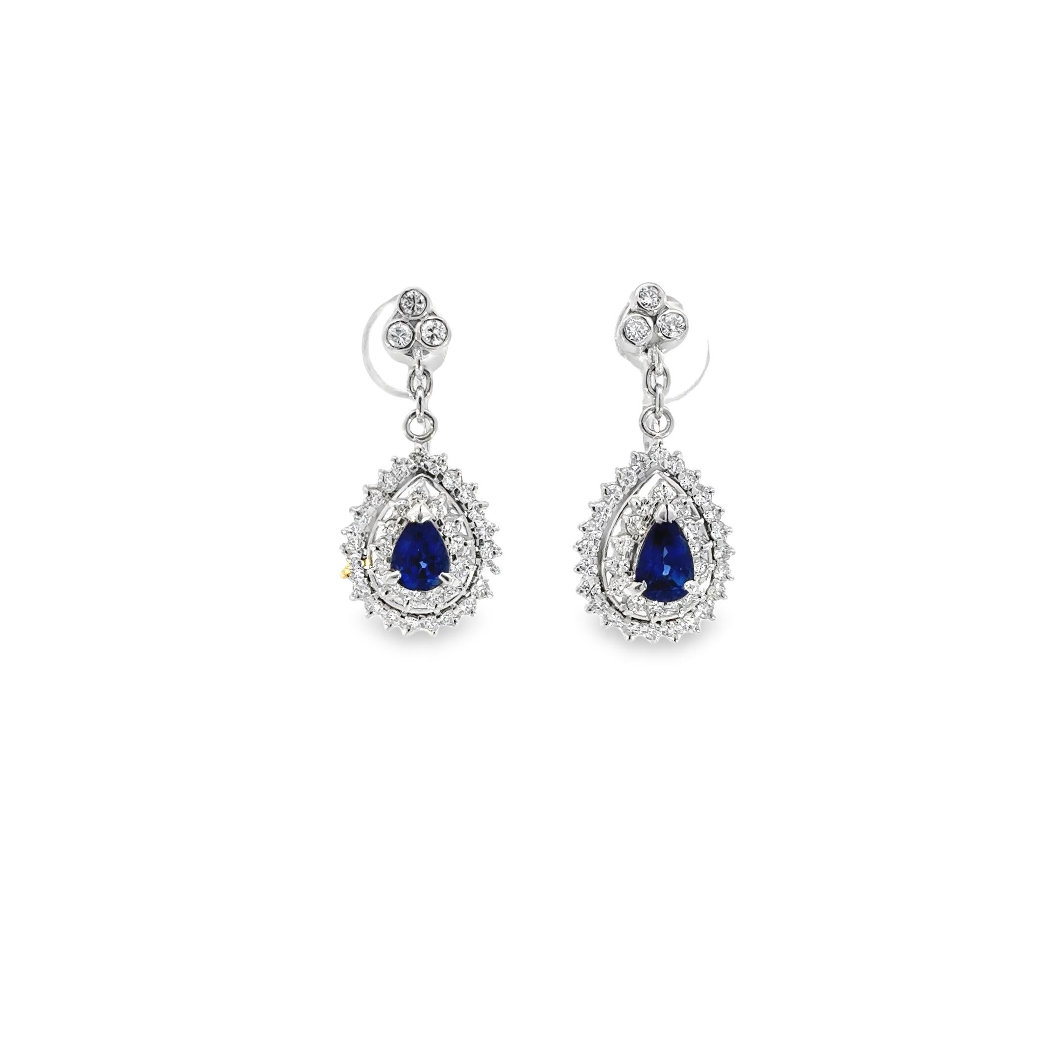 Modern Diamond and Blue Sapphire Dangling Earrings in Platinum For Sale