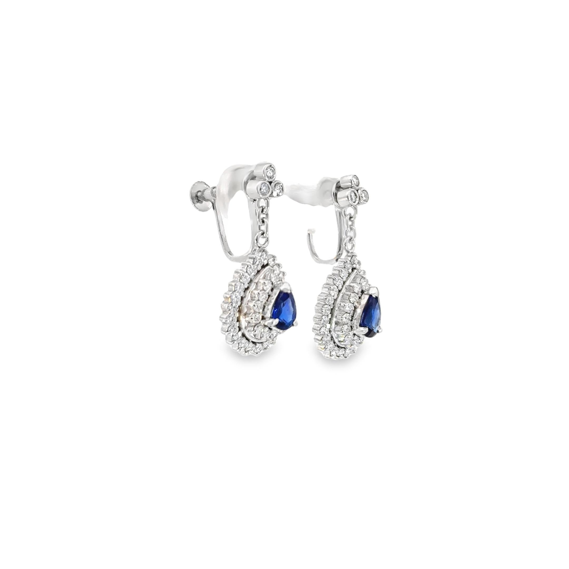 Pear Cut Diamond and Blue Sapphire Dangling Earrings in Platinum For Sale