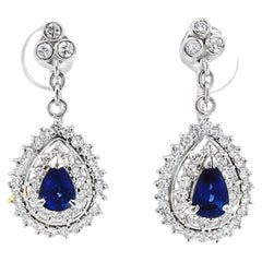 Pendientes Colgantes de Platino con Diamantes y Zafiro Azul