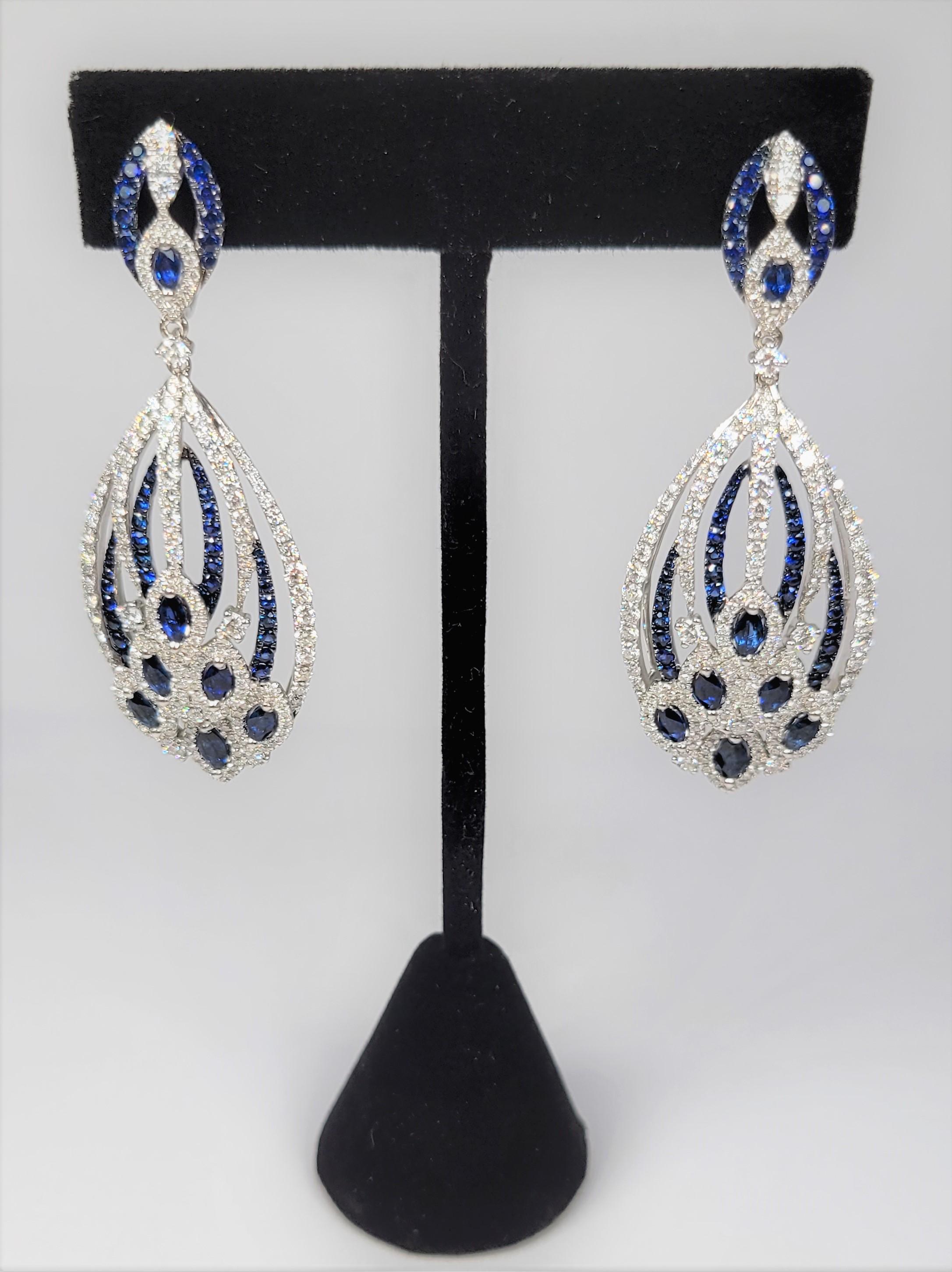 Round Cut Diamond and Blue Sapphire Earrings in 18 Karat White Gold For Sale