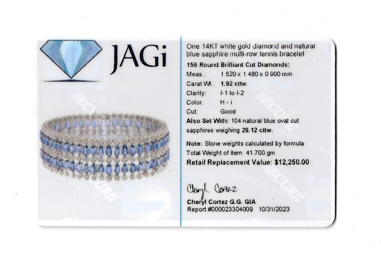 Mehrreihiges Manschettenarmband mit Diamanten und blauem Saphir aus 14 Karat Weißgold im Angebot 1