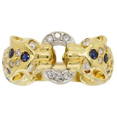 Diamond and Blue Sapphire Panther Ring in 18 Karat Gold