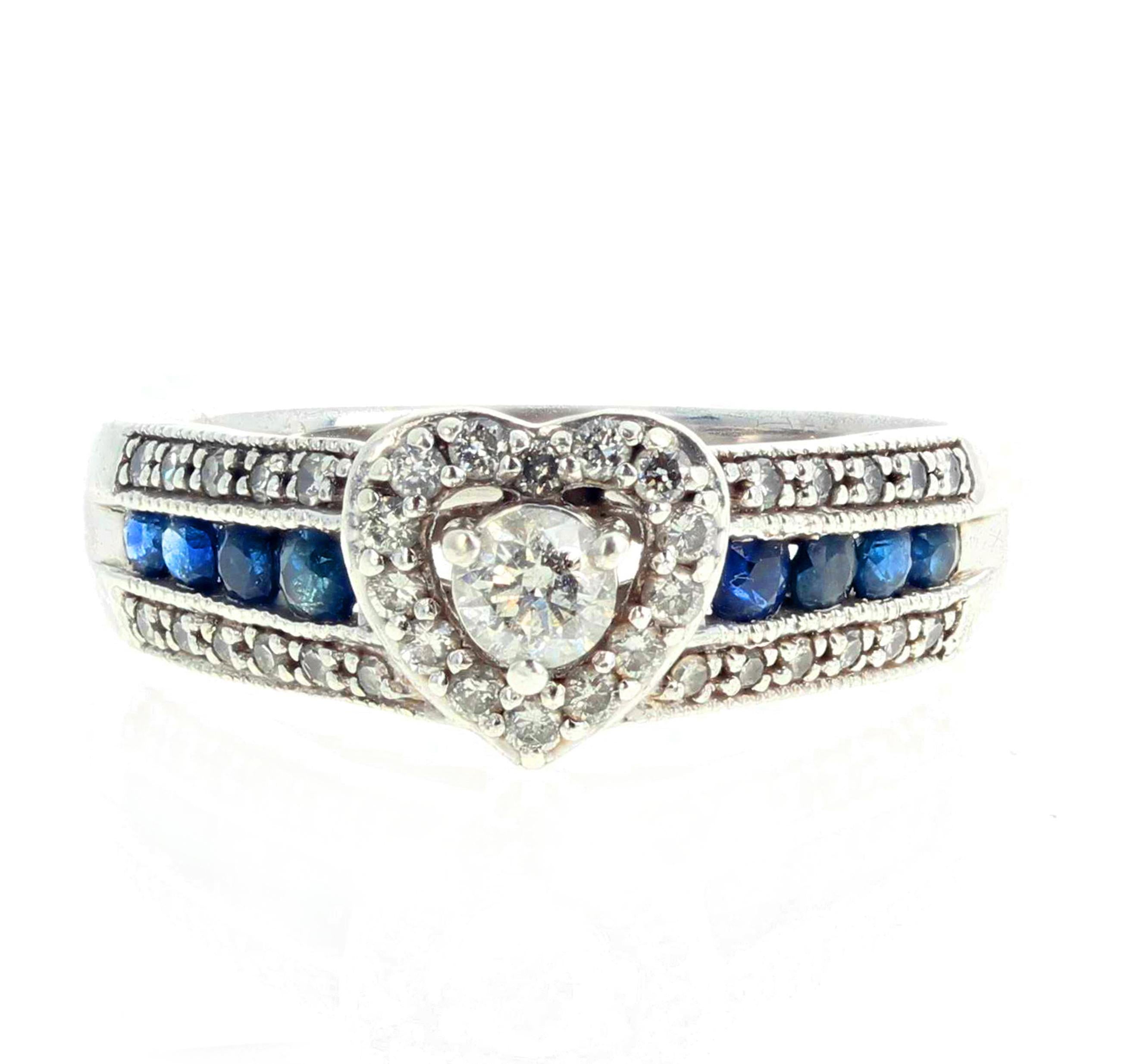 Glittering Diamond  - round brilliant cut center gemstone I J 12 color and clarity - and Blue Sapphire ring set in Sterling Silver and 5% Platinum so it is always beautifully shiny.  The center White Diamond is 3/8 carat.  It is enhanced with lovely