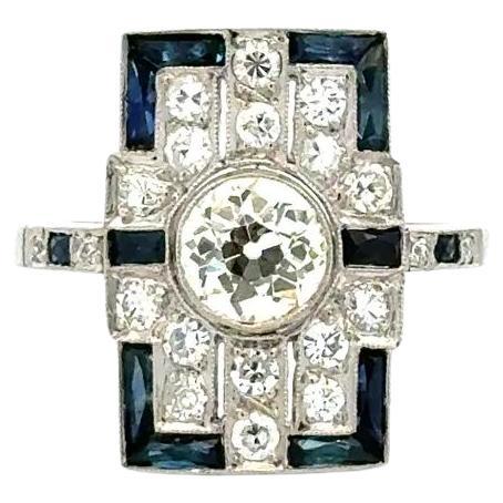 Bague de cocktail vintage à bouclier en platine avec diamant et saphir bleu en vente