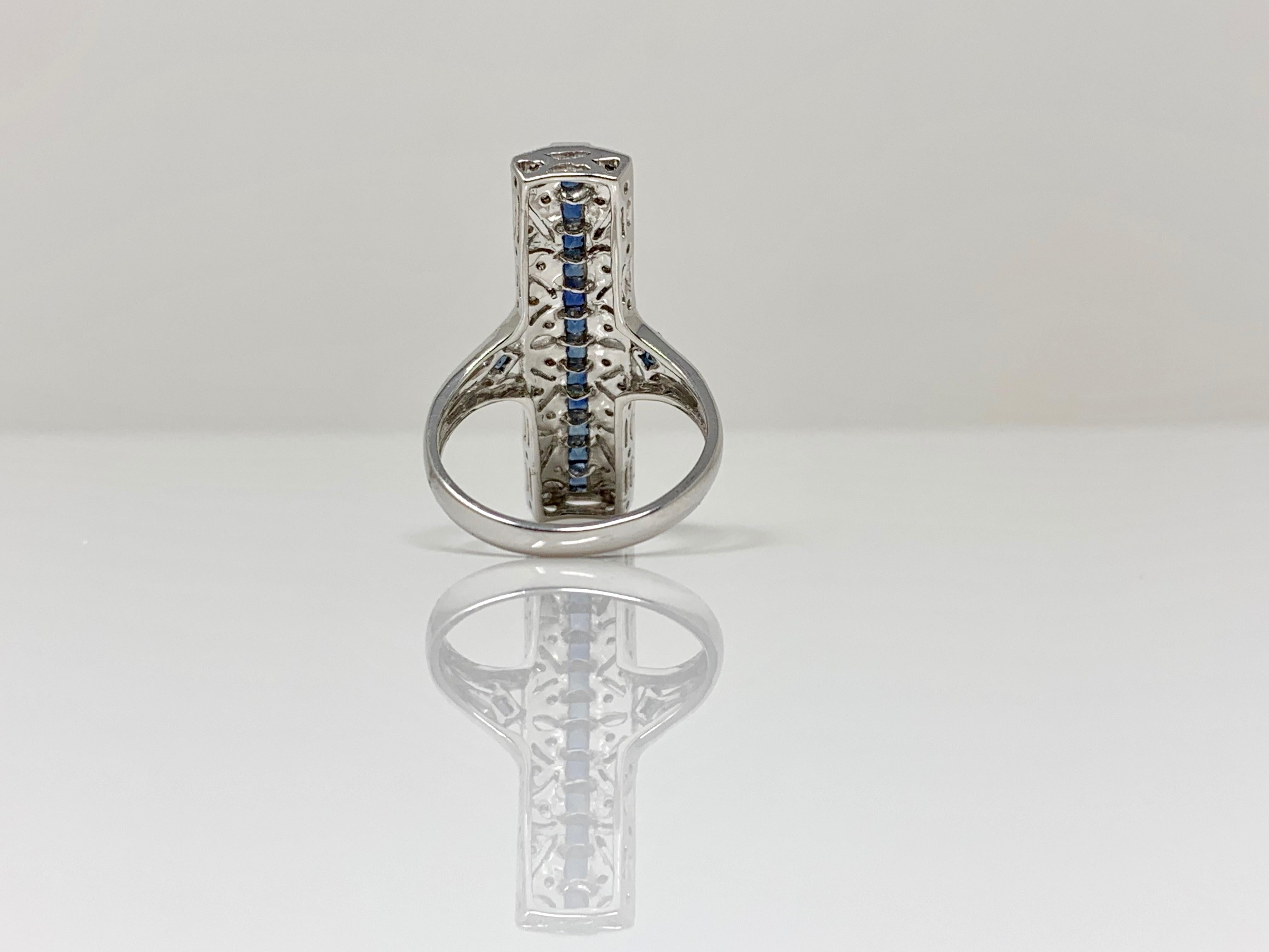 This trendy ring by Moguldiam Inc features blue sapphire and white diamond. 
Diamond :  0.12 carat 
Blue Sapphire : 1.05 carat 
Metal  : 14k 
Ring size : 6 1/4 

