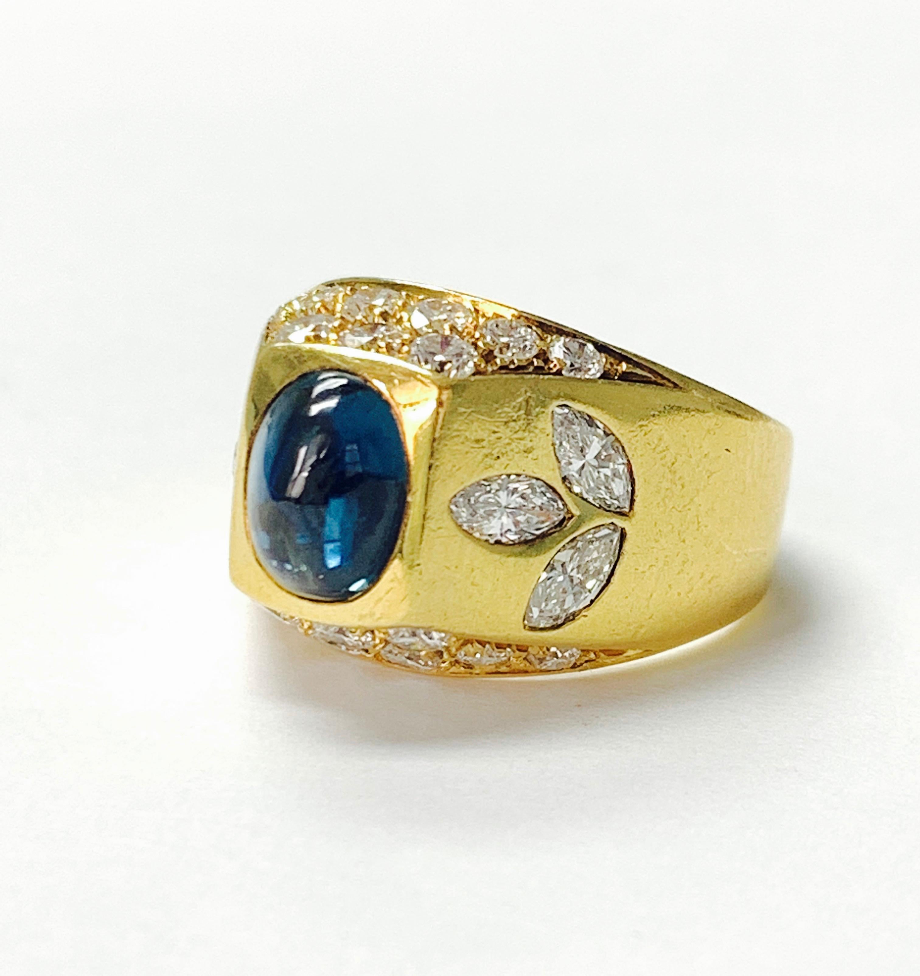 Oval Cut Diamond and Blue Sapphire Ring in 18 K Yellow Gold For Sale